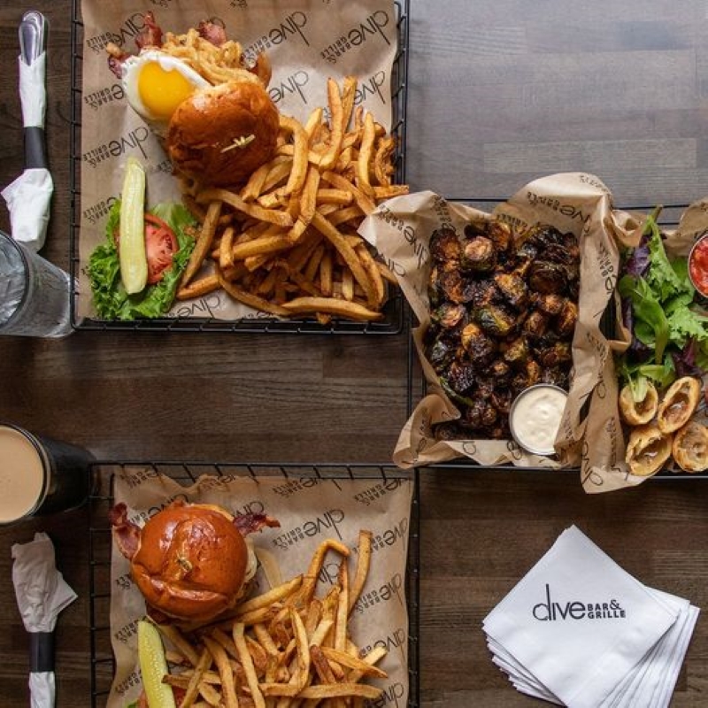 Dive Bar and Grille food items on a table.